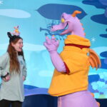Figment greets Bri.