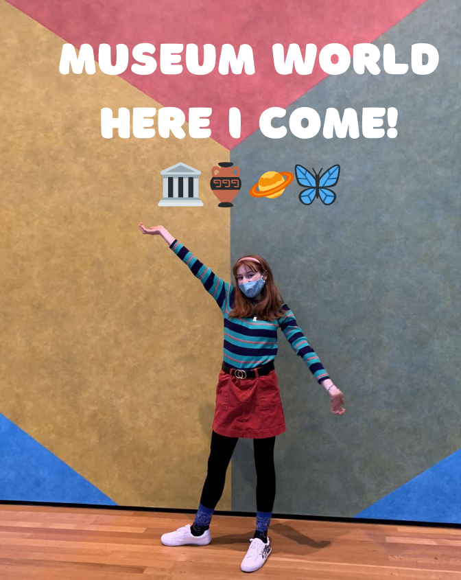 Bri stands in front of a large 2-dimensional piece of abstract art with one hand up and another down like presenting. The text says "Museum world here I come" with a bunnch of museum symbol emojis.