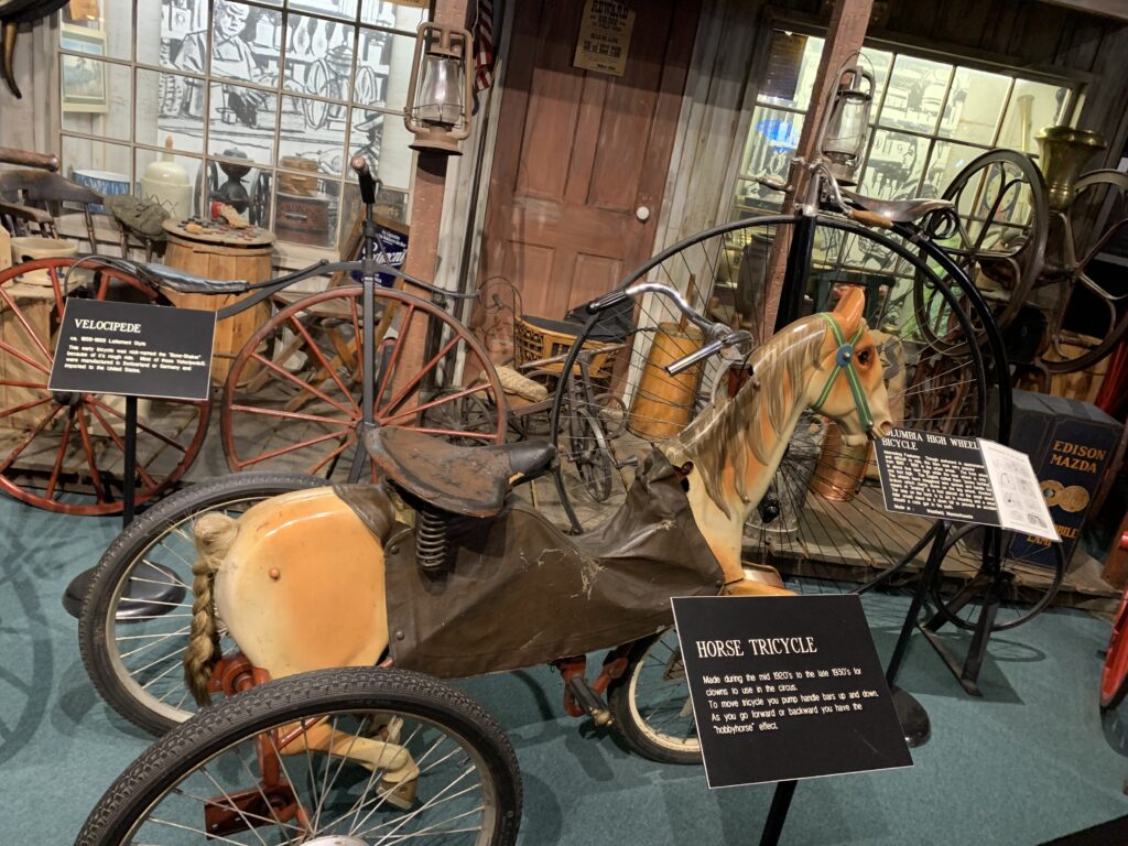 Picture of an old wooden wheeled horse.