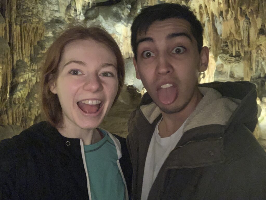 Selfie of Bri and Alix in a cave.